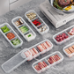 Caja organizadora con compartimento para mantener la frescura en el refrigerador