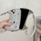 Funda creativa para iPhone con asa superior